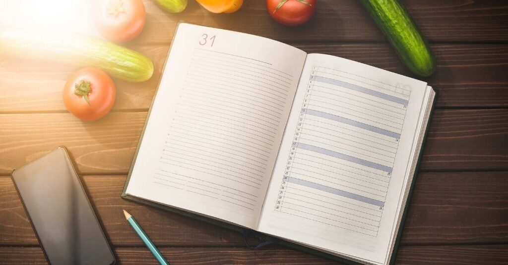 Organization Strategic Plan is like meal planning - calendar planner surrounded by vegetables